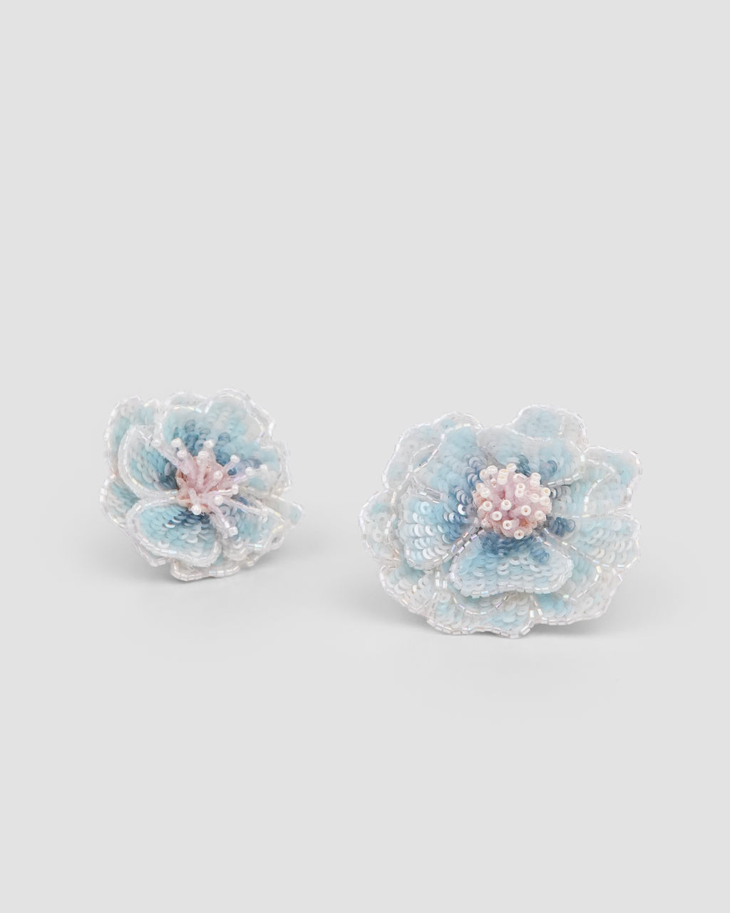 Blue Rosette Clip girls flower hair clips with layered petals and beaded centres by House of Carousél