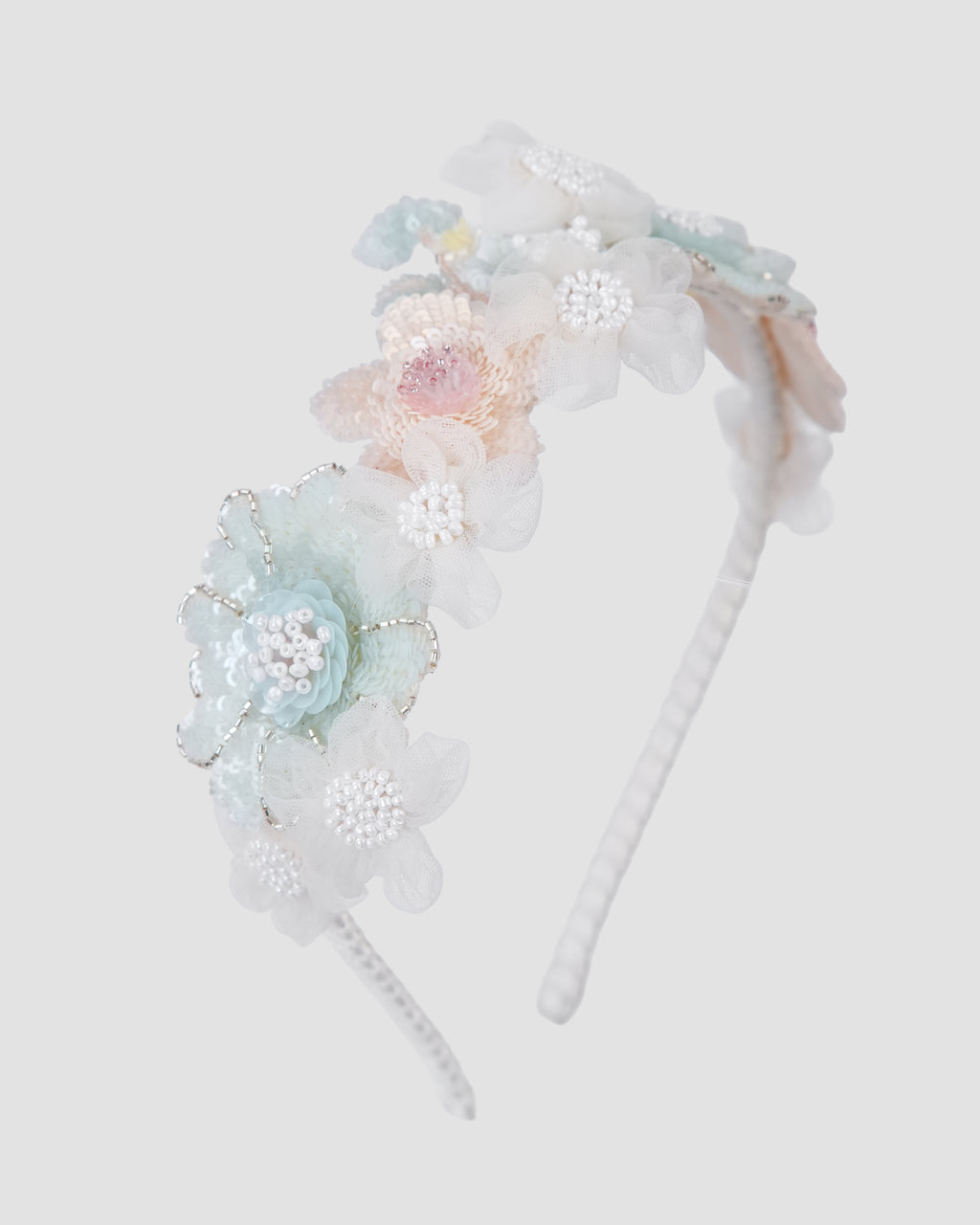 Crown of Grace headband with dimensional tulle flowers, sequins and pearl details by House of Carousel