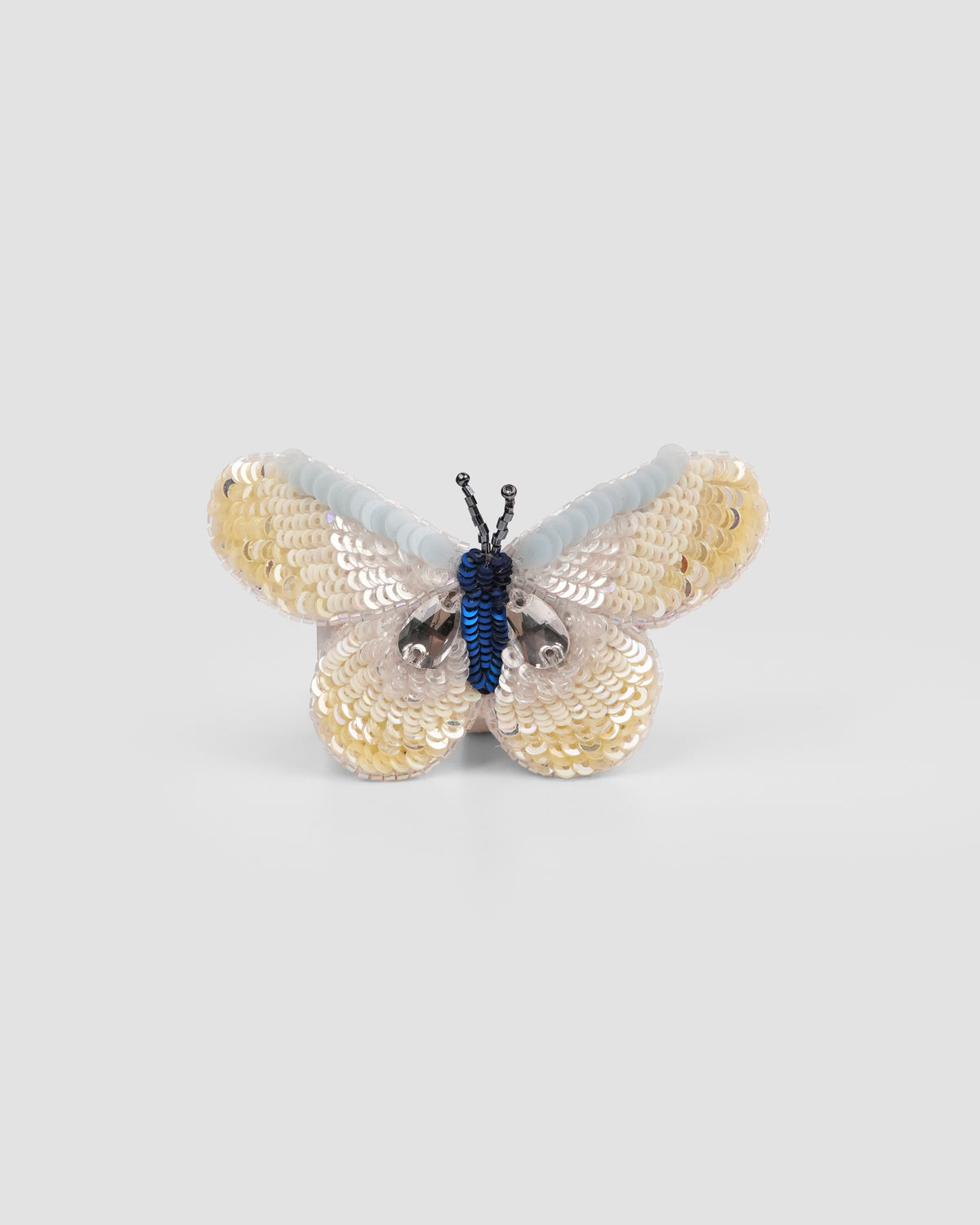 The Daydream butterfly hair clip with sequin and crystal wings by House of Carousél available at House of Aura Lebanon