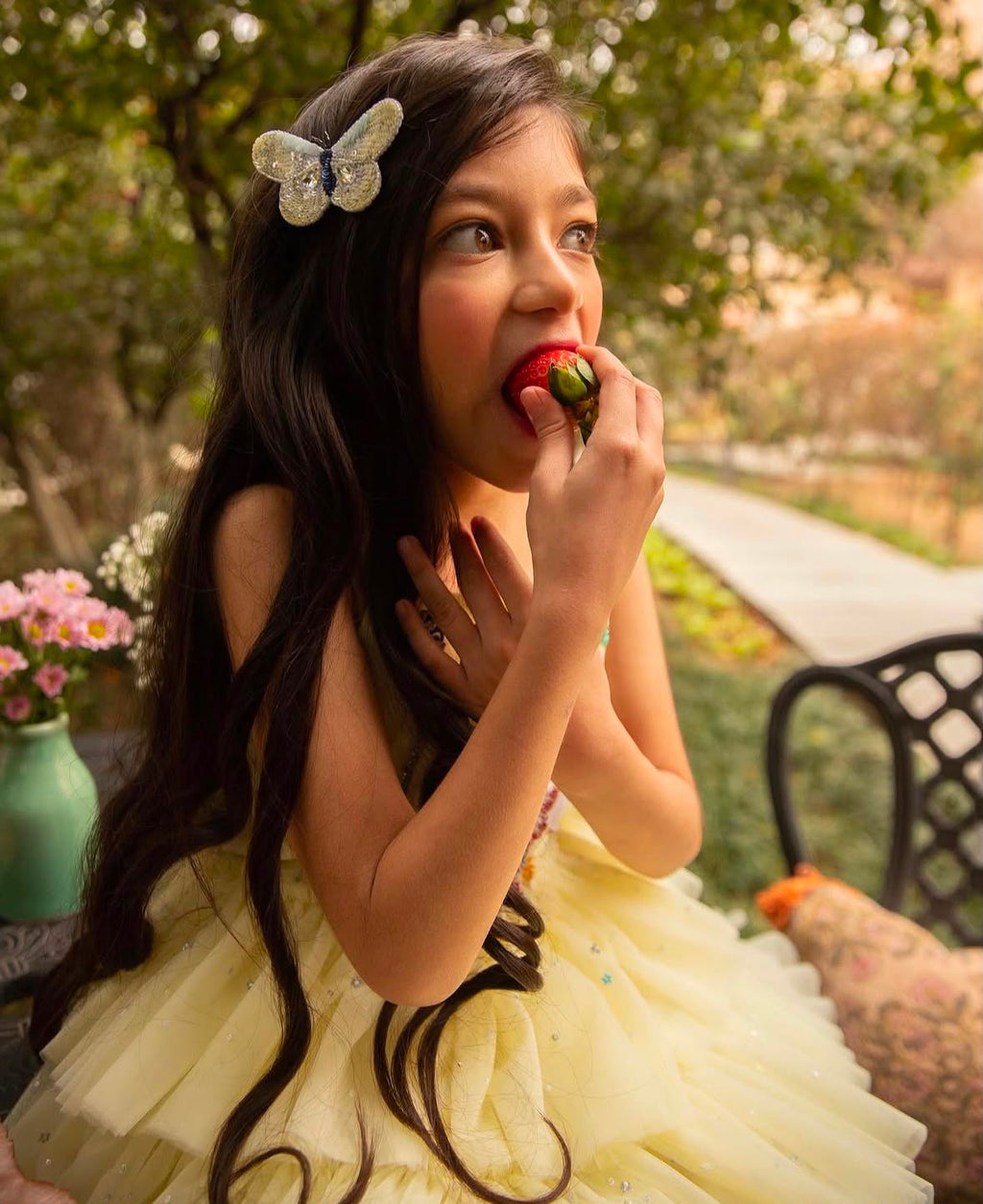 Girl wearing The Daydream butterfly hair clip by House of Carousél