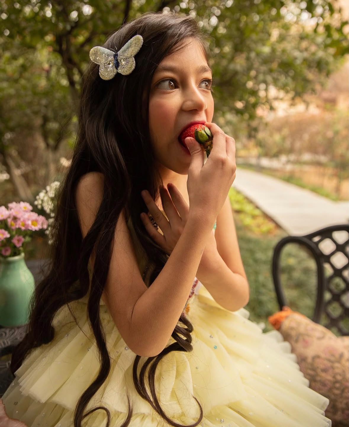 Girl wearing The Daydream butterfly hair clip by House of Carousél