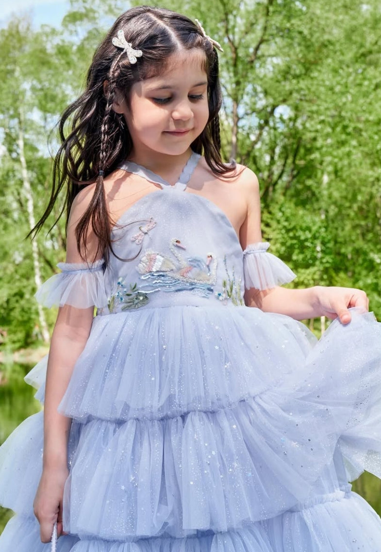 Girl wearing Dragonfly Dazzle clip as a whimsical hair accessory by House of Carousel