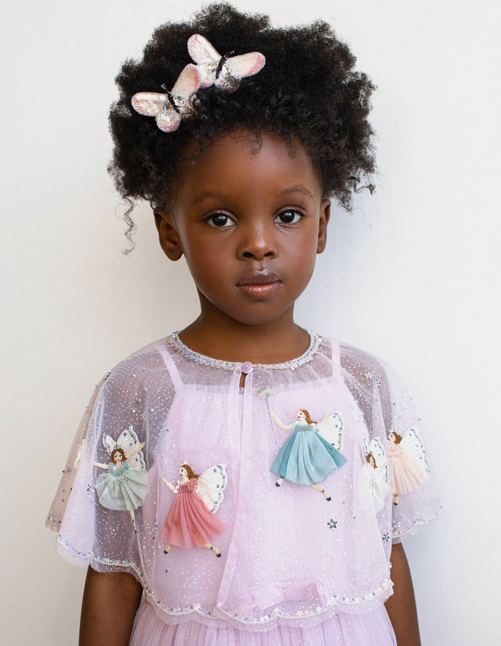 Girl wearing Fairies in the Starry Night embroidered fairy dress by House of Carousel