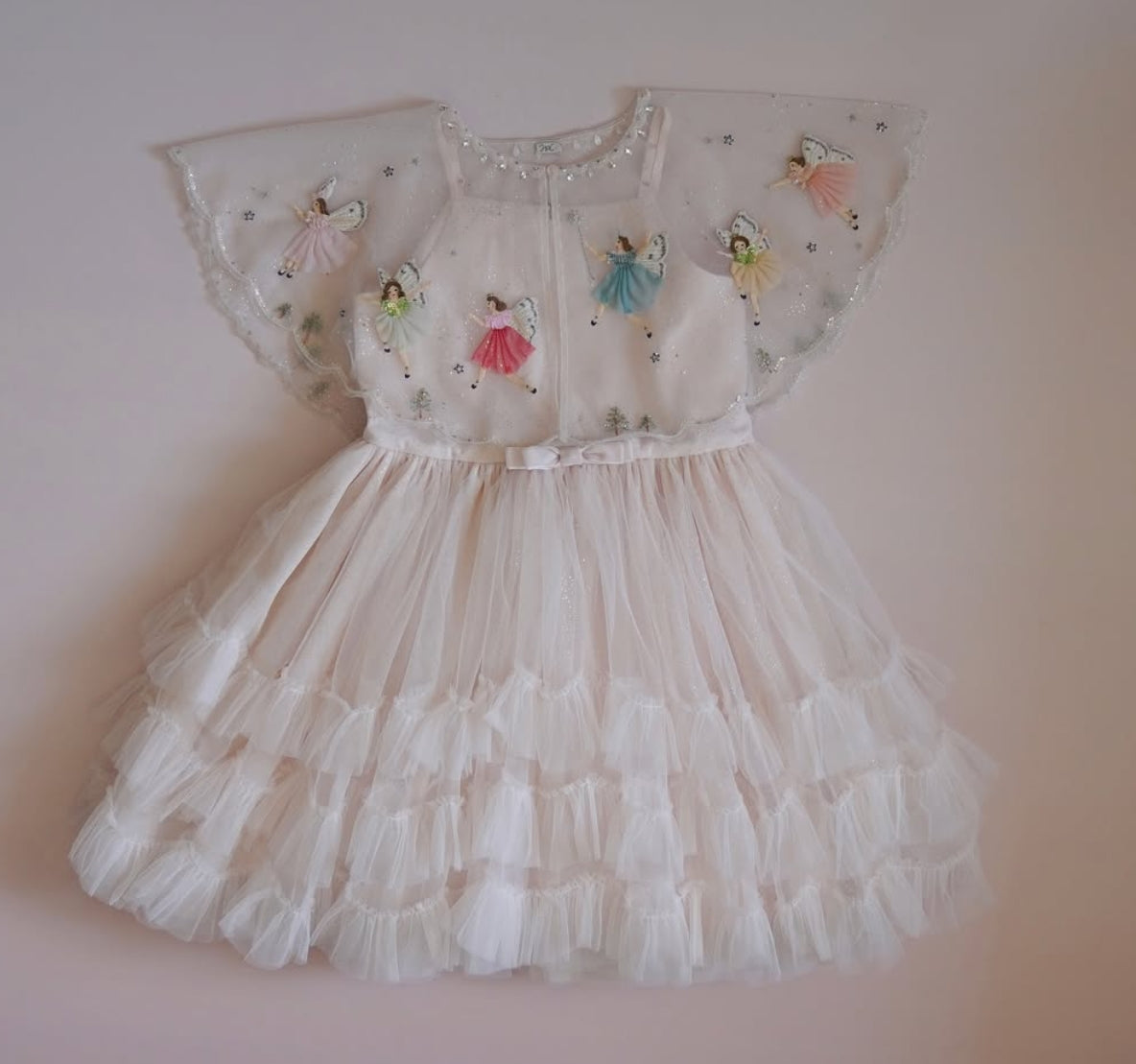 Ivory Fairies in the Starry Night dress with colorful fairy appliqués by House of Carousel