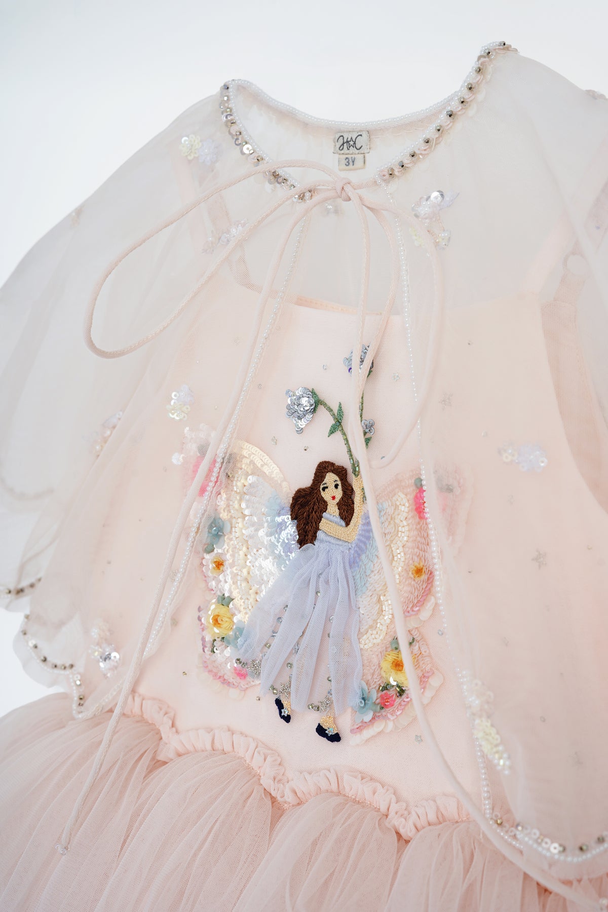 Hand-embroidered fairy, beaded flowers and sequin details on Fairy by Herself Dress