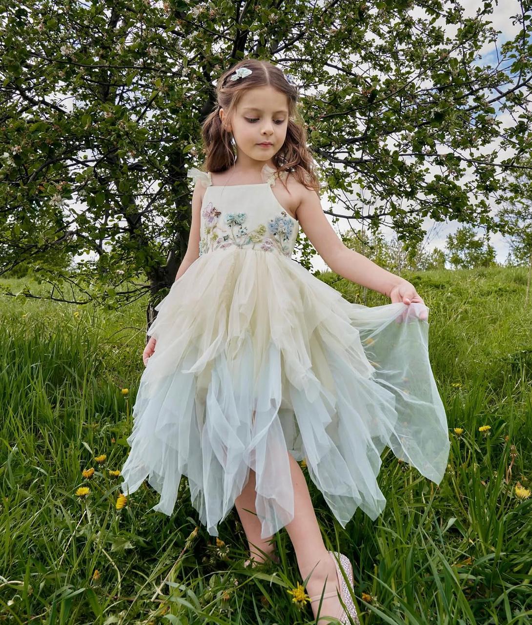 Girl wearing the Garden Song Clips by House of Carousel