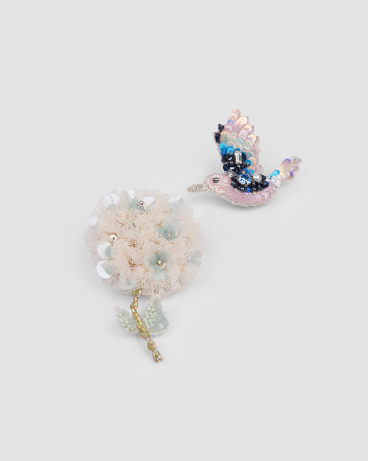 Garden Song Clips pair with hand-embroidered songbird and floral motifs by House of Carousel available at House of Aura Lebanon