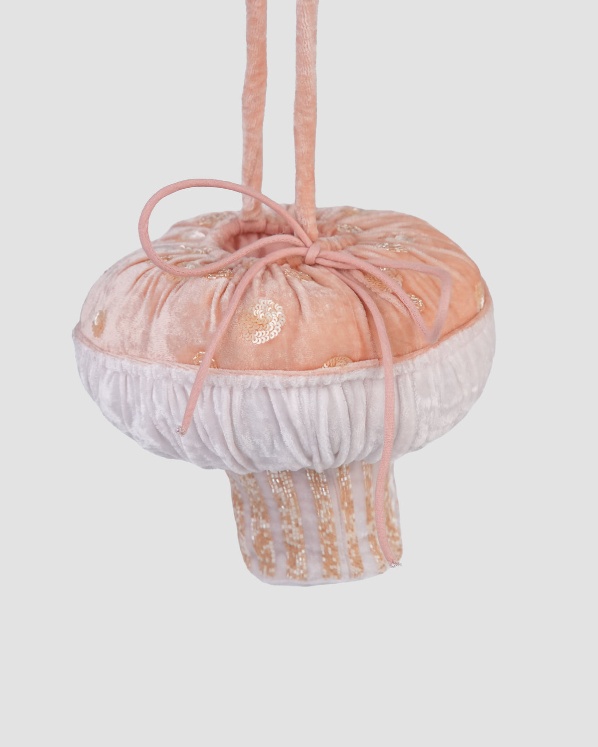 Coral velvet mushroom bag for girls with embroidered flowers and drawstring straps by House of Carousél