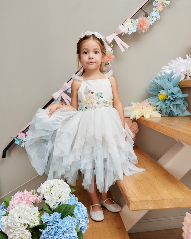 Hydrangea Fairy Dress with layered tulle skirt and blue hydrangea embellishments on a girl by House of Carousel
