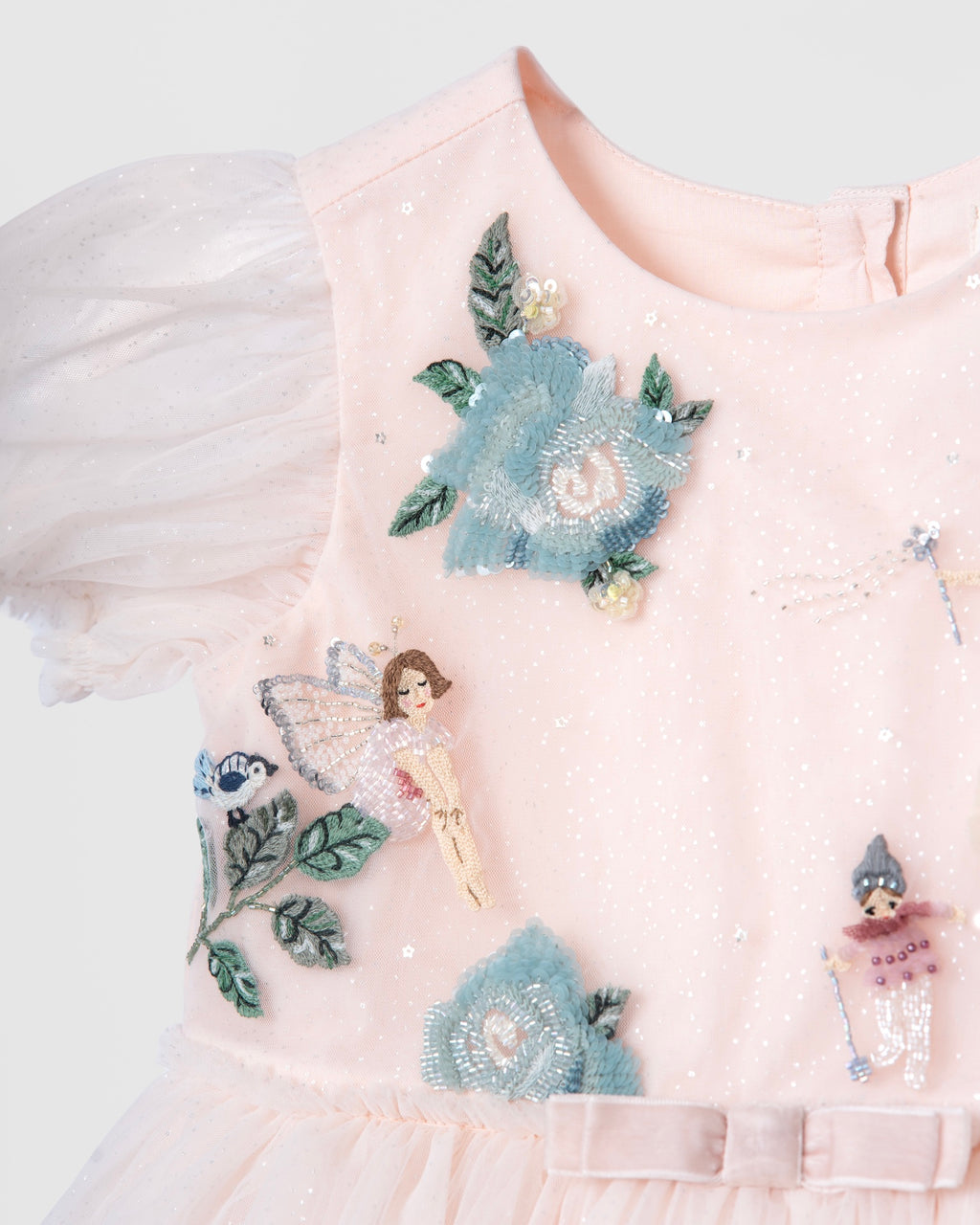 Hand-beaded fairy and floral embroidery on the Secret Garden of Roses tulle dress by House of Carousél