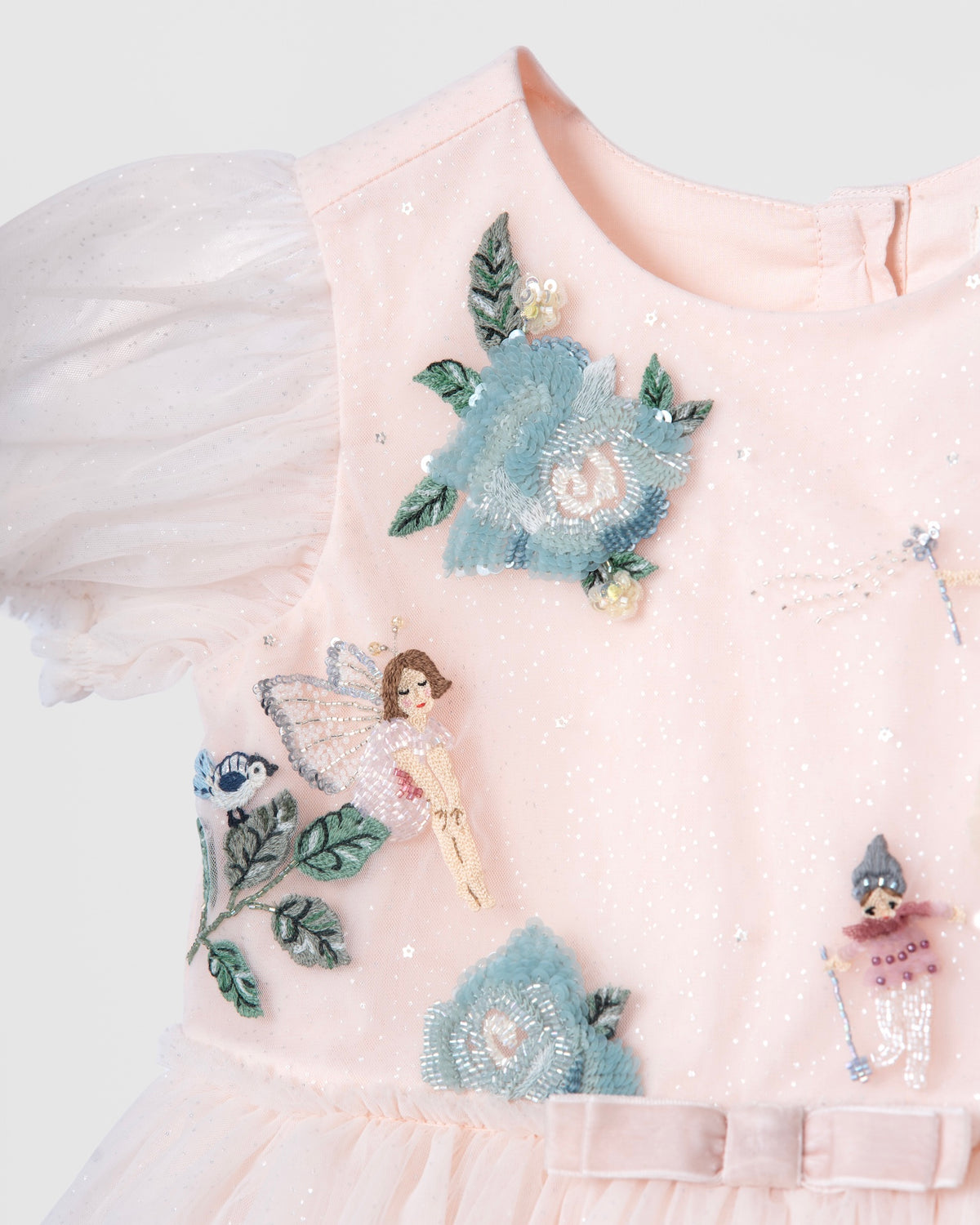 Hand-beaded fairy and floral embroidery on the Secret Garden of Roses tulle dress by House of Carousél