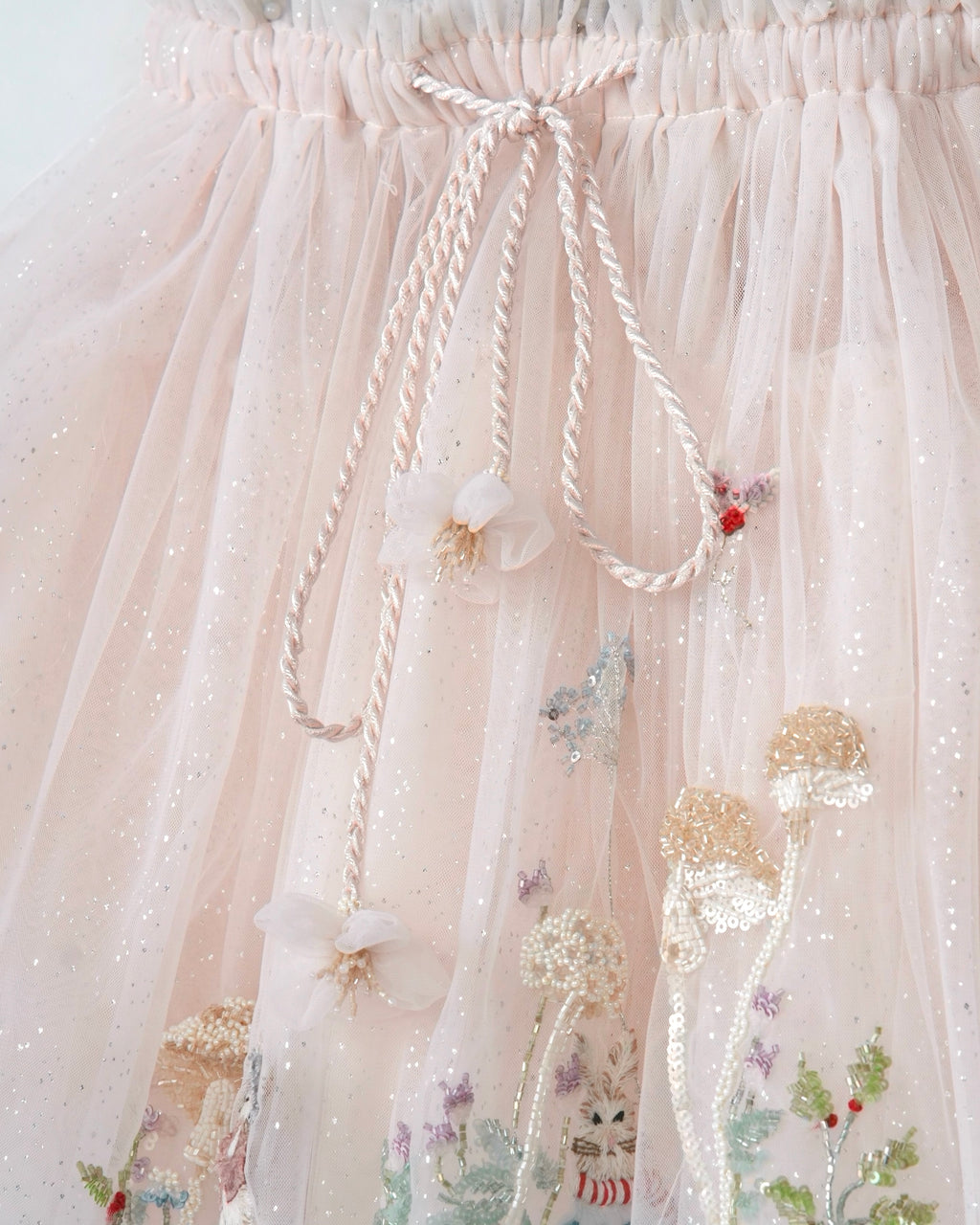 Baby peach embroidered tutu skirt with bunny and floral details from the Tales of the Bunny Parade Set