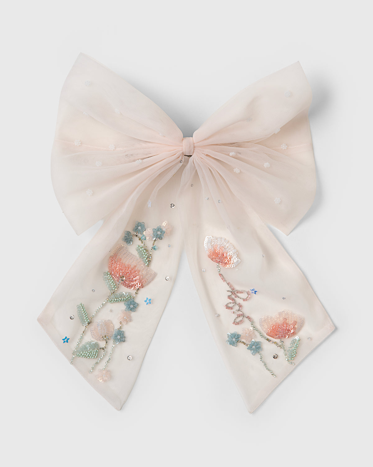 Tulip Garden tulle hair bow with embroidered flowers by House of Carousél available at House of Aura Lebanon