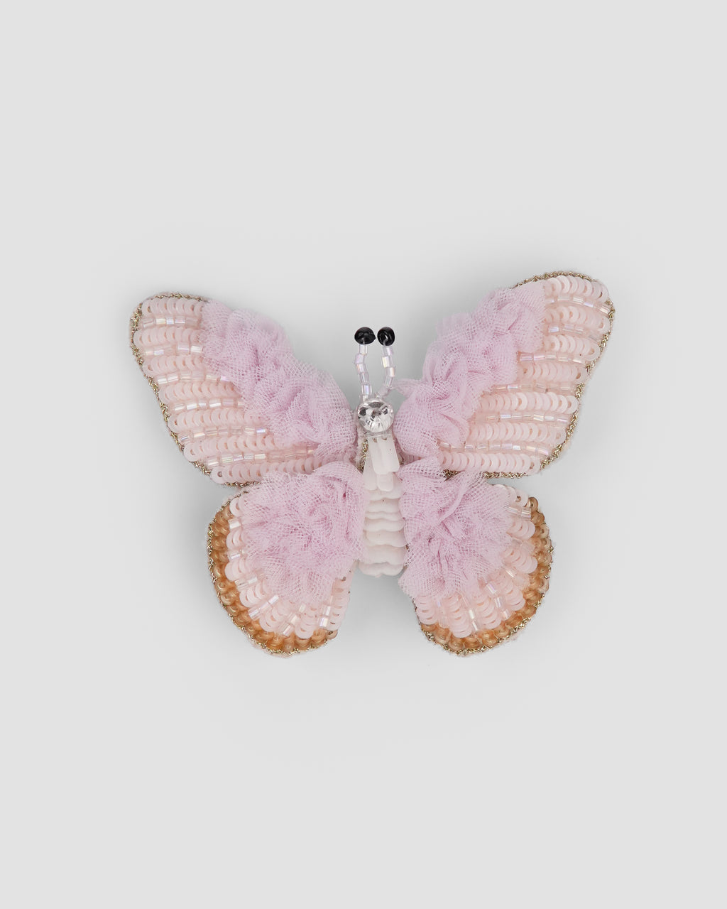 Back view of Tulle Flutter butterfly hair clip with metal alligator fastening by House of Carousél