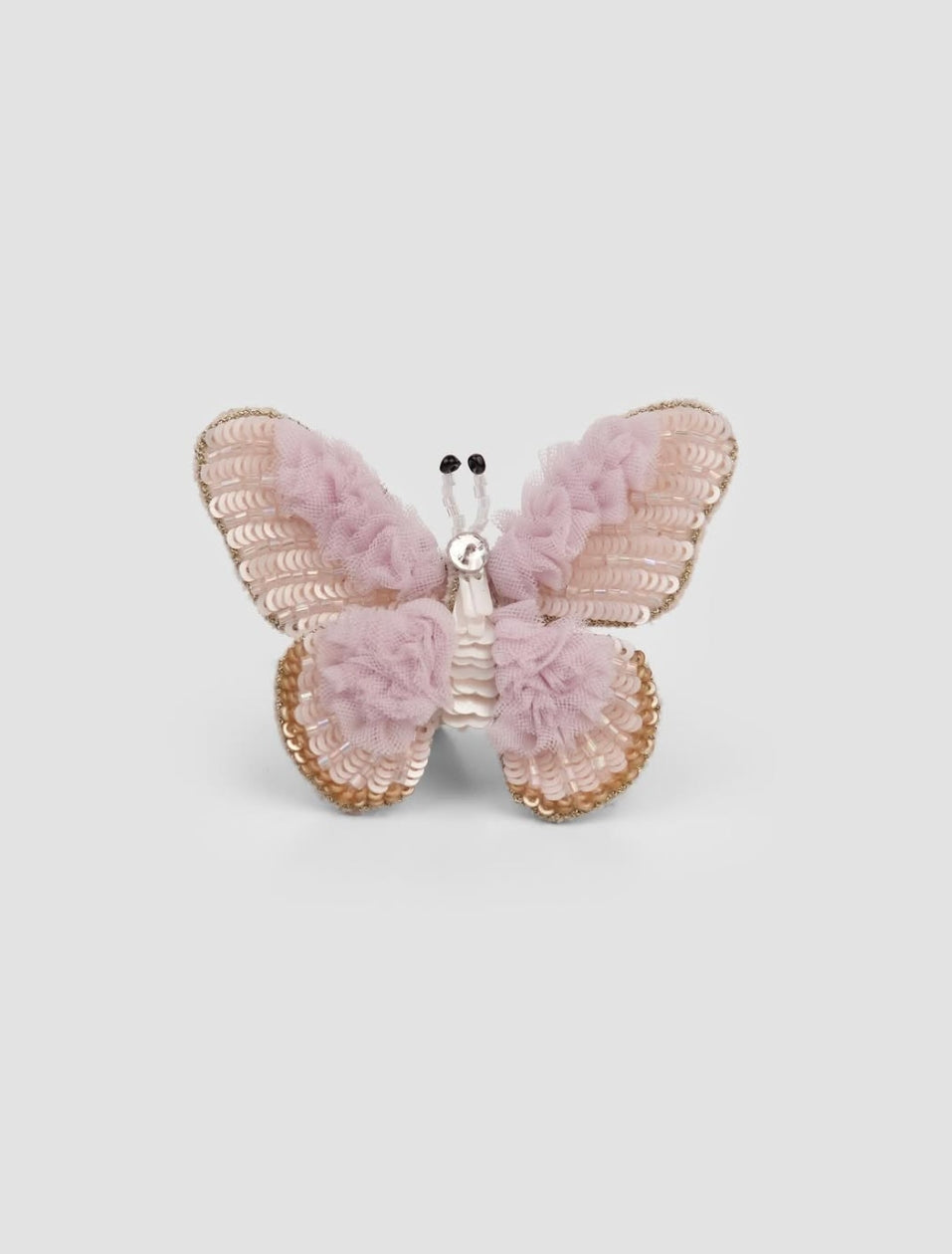 Lilac tulle butterfly hair clip with sequin wings and beaded details by House of Carousél