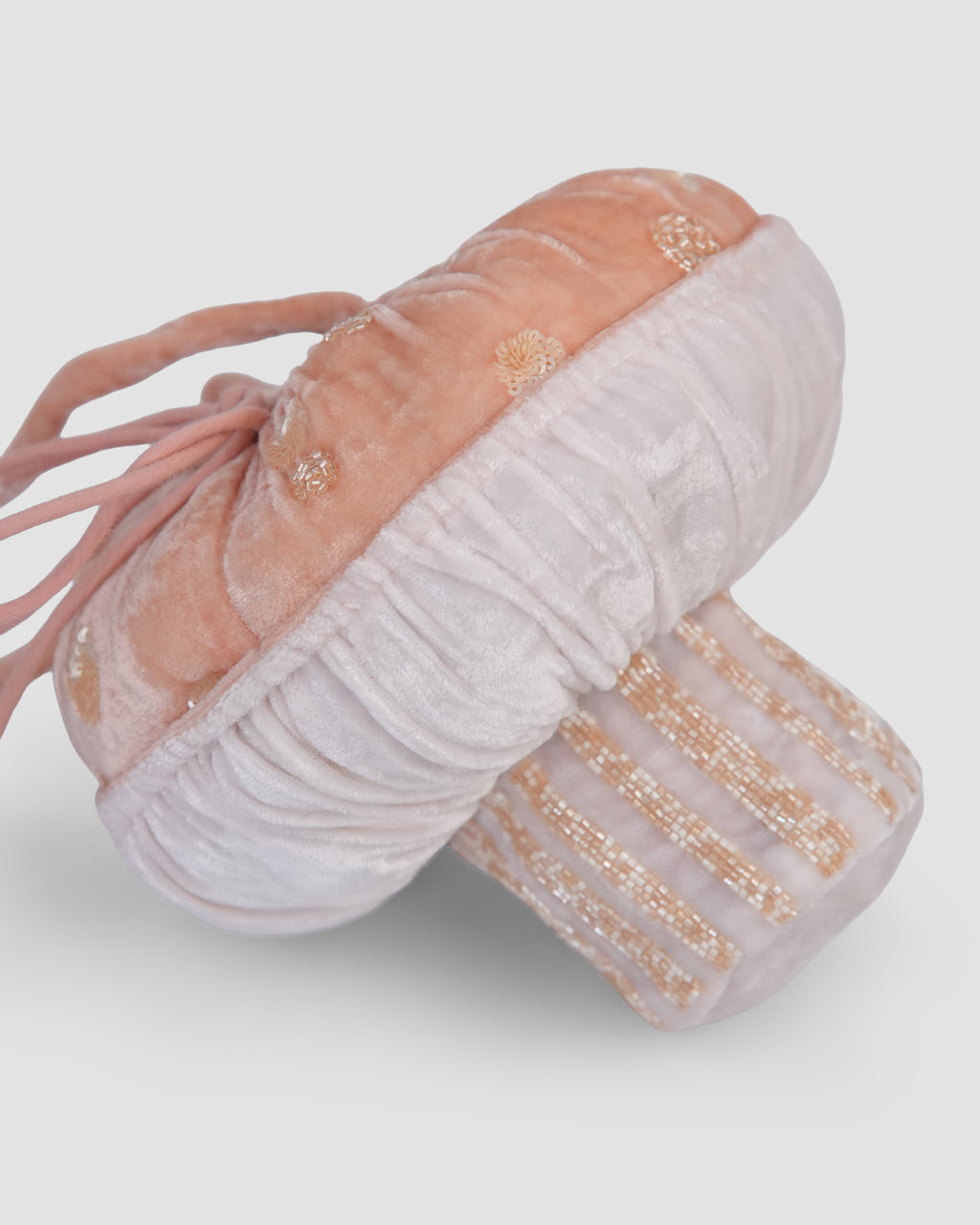 Close-up of the Whimsy Shroom Bag’s gathered velvet underside and vertical rows of gold beads on the stem by House of Carousél