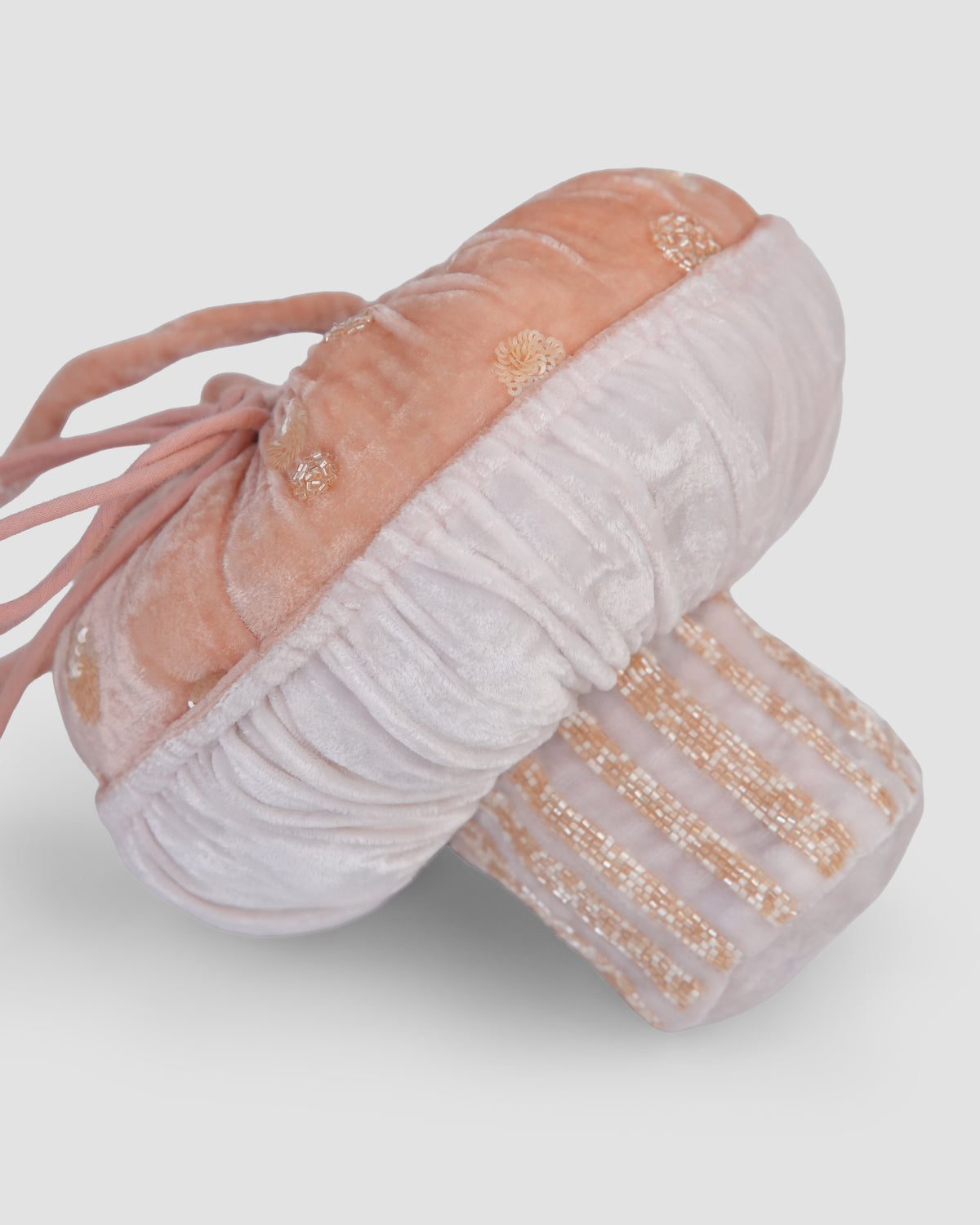 Close-up of the Whimsy Shroom Bag’s gathered velvet underside and vertical rows of gold beads on the stem by House of Carousél